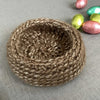 brown crochet nest with felt base