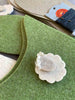 close up of Joe's toes sheepy slipper motif on green slipper top