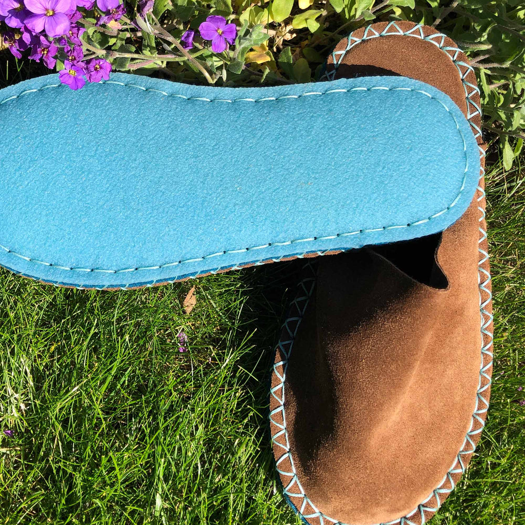 Joe's Toes luxe mule slippers in brown suede showing turquoise crepe rubber soles