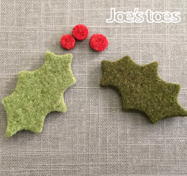 felt holly leaves in two shade of green and three red felt holly berries